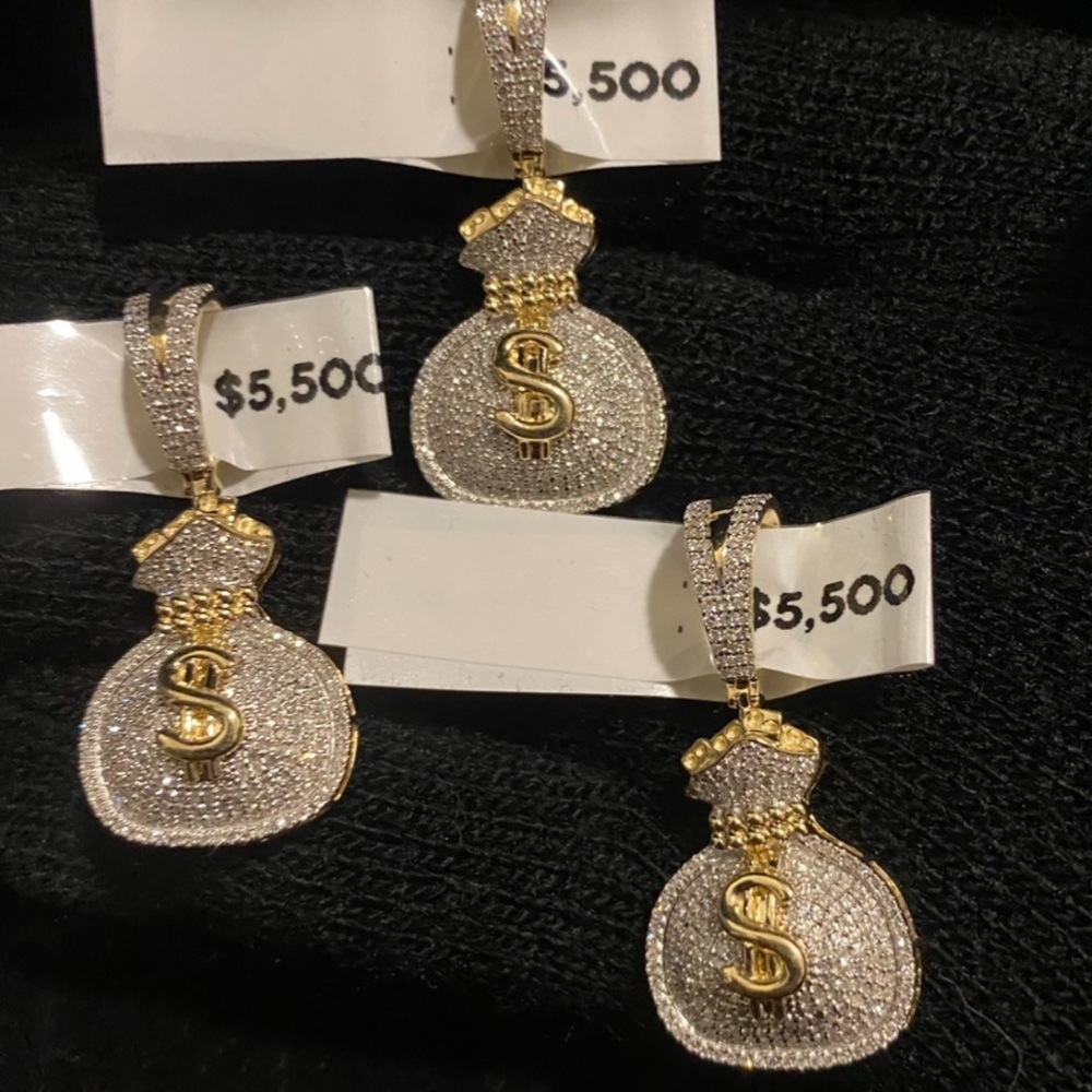 14k iced out money bag pendant!!